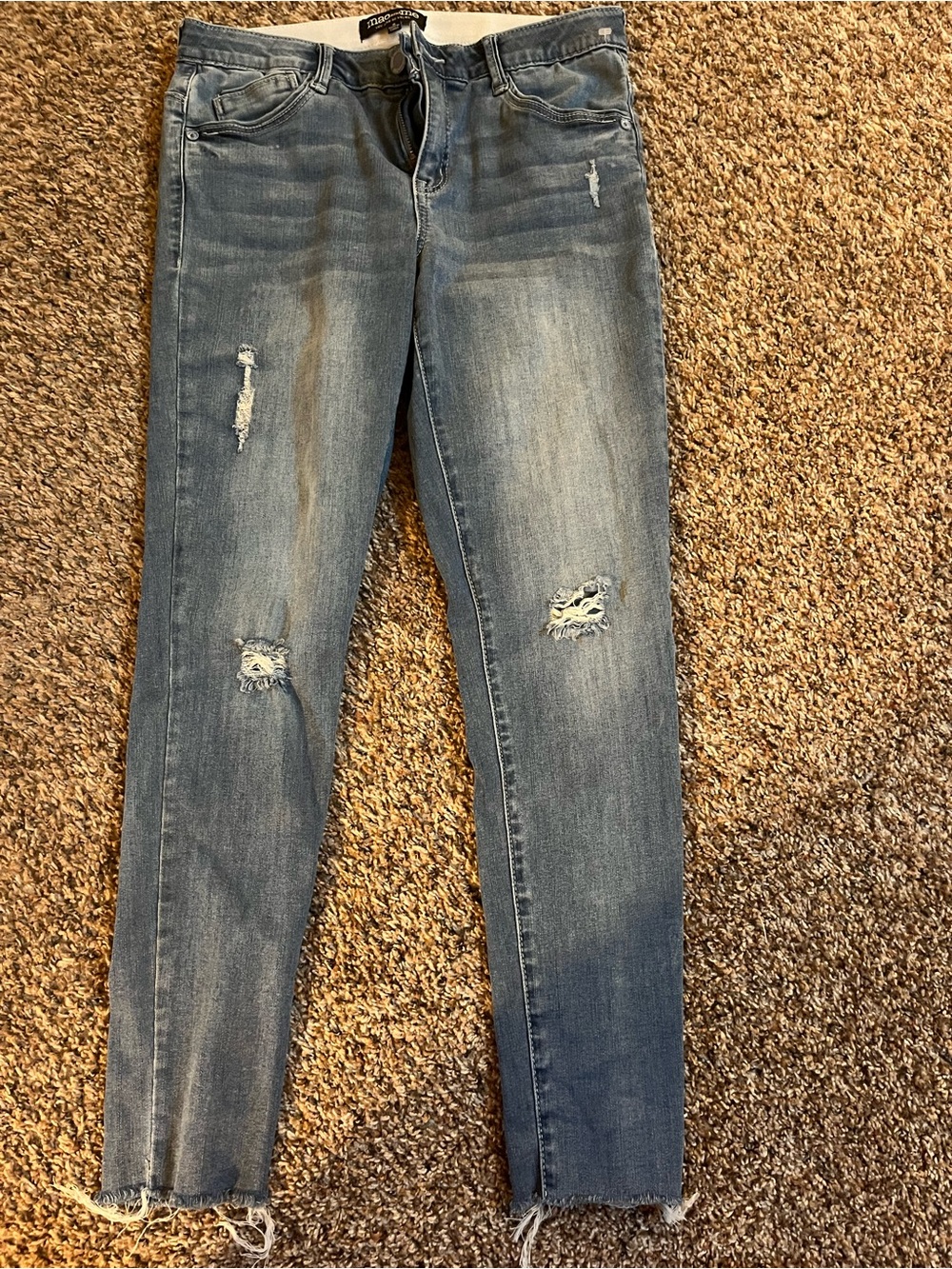 Distressed Skinny Jeans in Faded Blue
